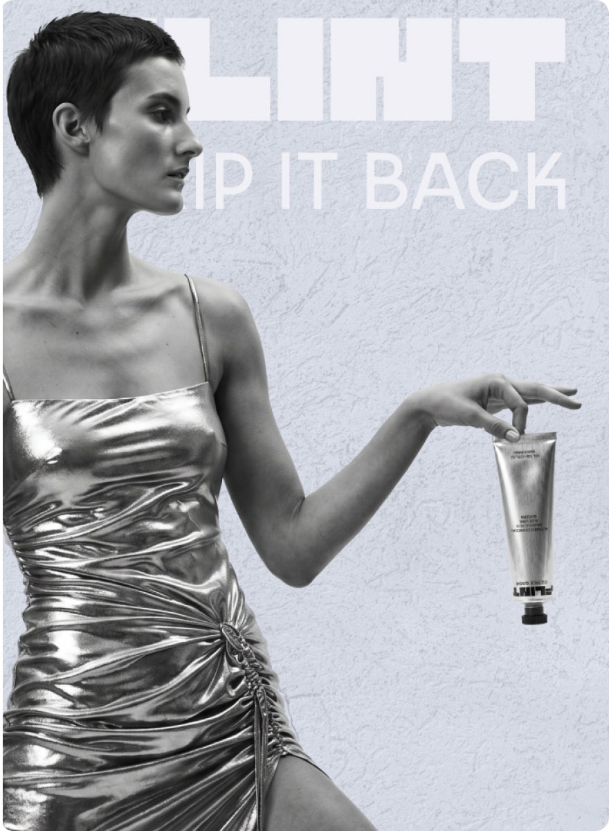 Flint image 2x Black and white campaign poster for Flint skincare, a woman with cropped hair in a metallic dress holds a silver product tube, with the FLINT logo and "Strip It Back" tagline overlaid
