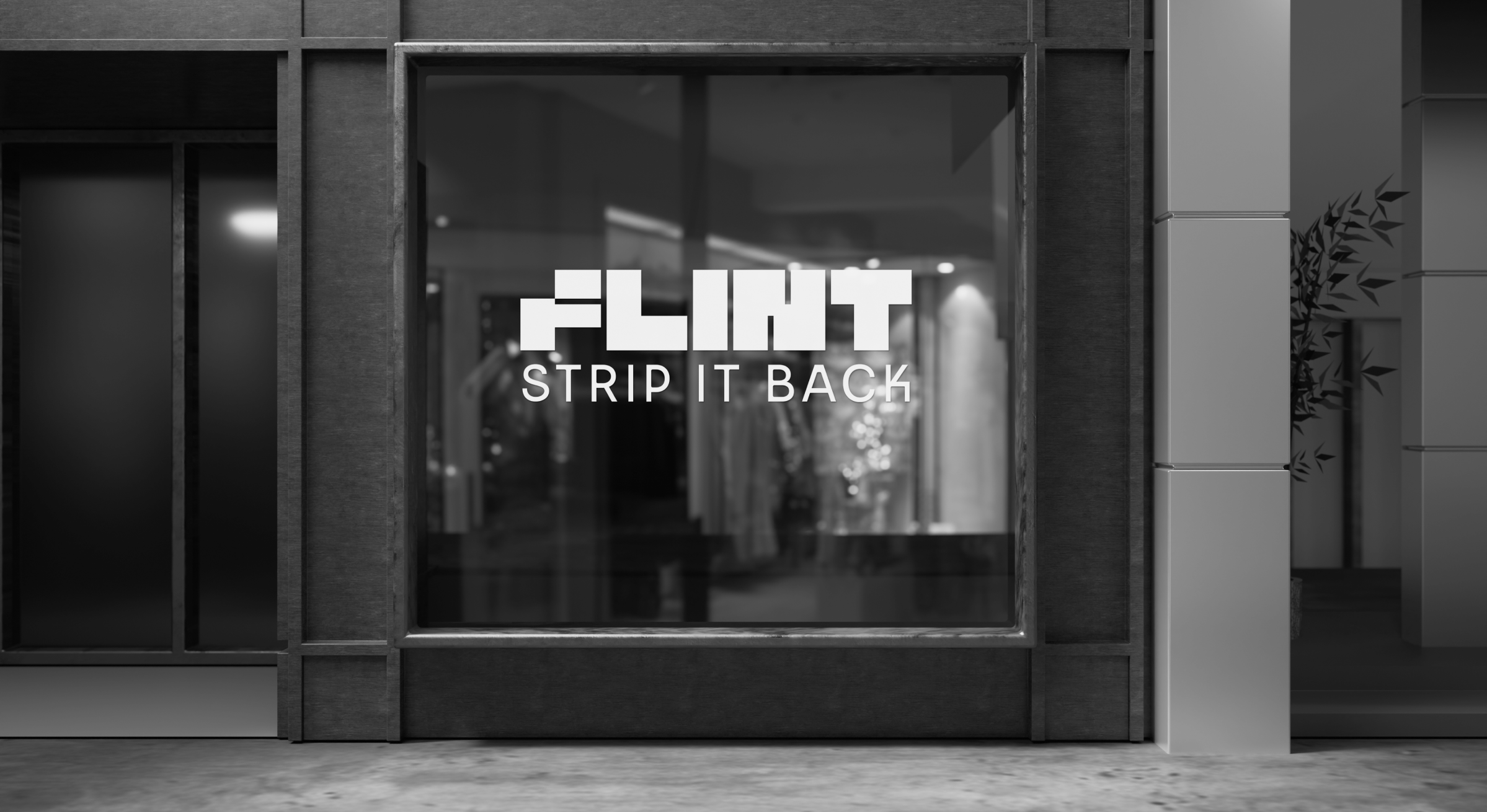 Mockup of a shopfront window at night with the Flint logo and "Strip It Back" tagline in vinyl lettering